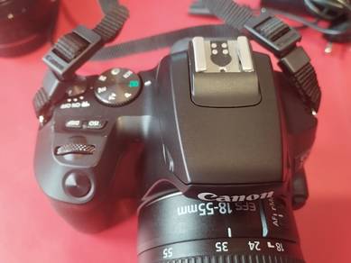 Canon EOS 250D DSLR + 18–55mm Kit Lens + 50mm STM