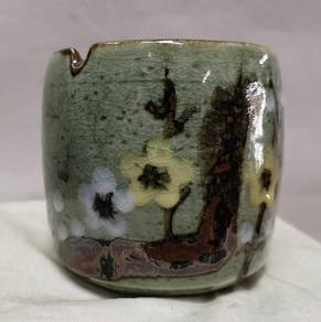 "Handcrafted Ceramic Ashtray with Kintsugi-Style R