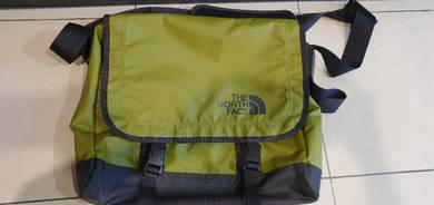 95% New north face original sling bag/messenger