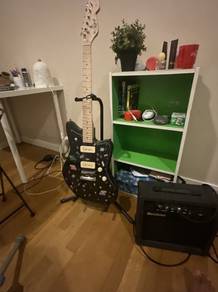 lightly used jcraft guitar with good rextone amp.