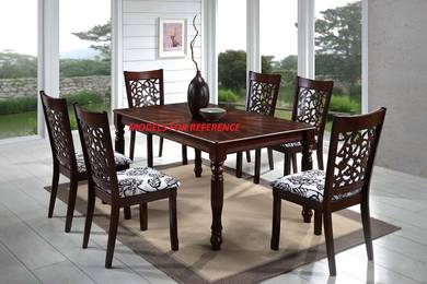 Table with nice design and chair with carving