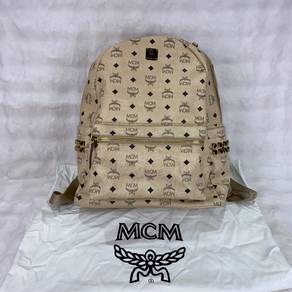 Authentic MCM Beige Star Side StudsMedium Backpack
