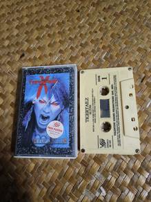 Kaset (Tigertailz
Bezerk)