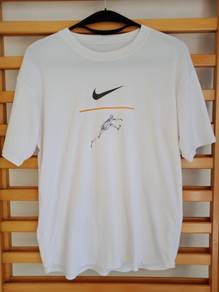 Vintage Nike Center Swoosh running man t-shirt USA