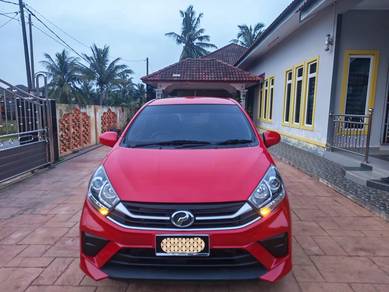 Perodua Axia GXTRA in Kubang Kerian, KTN