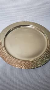 Gold hammered metal charger plate. 