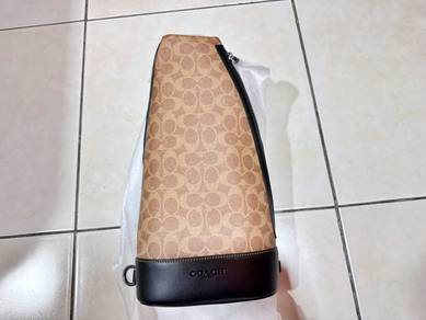 Coach Dominic In Signature Canvas Sling Bag In Tan