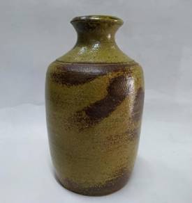vintage 70s, midcentury ceramic brown tones, dried