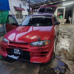 Proton Satria GLi SE in Paya Terubong, PNG