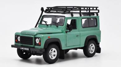 Land Rover green Defender w/ Roof Rack and Snorkel