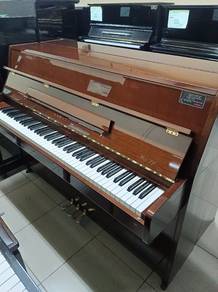 Kawai small wood piano