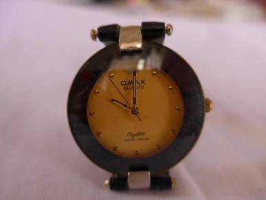 Omax Round Yellow Dial Watch