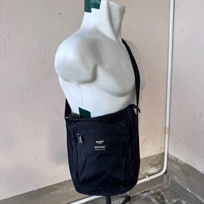Anello vertical shoulder sling bag
