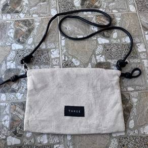 Three crossbody sling bag