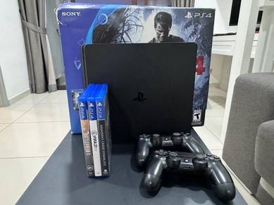 PS4 Slim 500GB + 2 controller + 4CD game