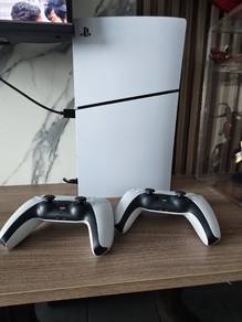 Ps5 slim digital and two controllers 