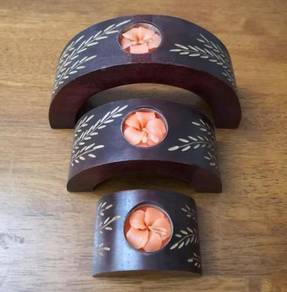Wooden candle holder lilin