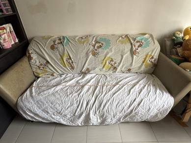 Beige Sofa with Cow Print Cover