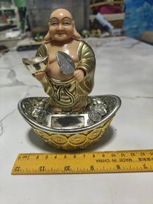 Csr solar powered laughing Buddha figurine