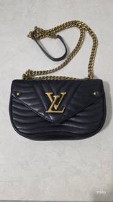 Black Quilted Leather Handbag with Gold Chain