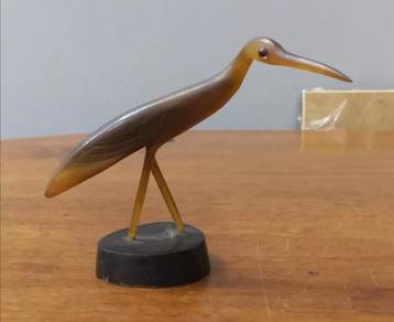 Small antique horn made stork