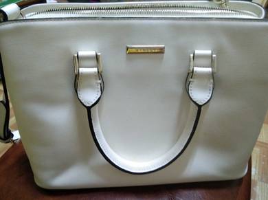 white leather bag