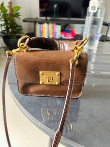 Charles & Keith Metallic turn lock bag