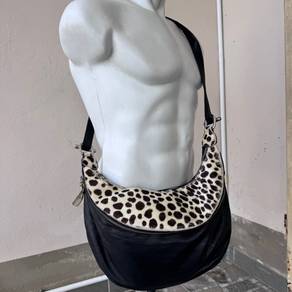 a black leather hobo-style shoulder bag