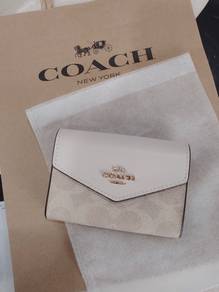 new coach card holder