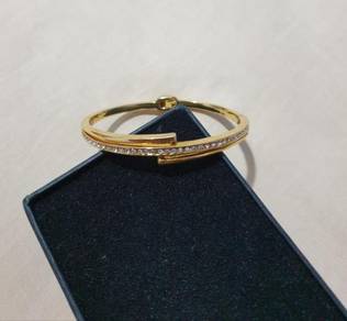 Brand new Denni & Co bracelet (lifetime warrantee)