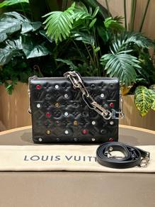 Louis Vuitton Monogram Embossed Crystal