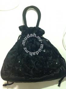 Black beaded drawstring evening dinner bag