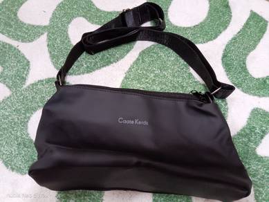 Sling bag caate kerds
