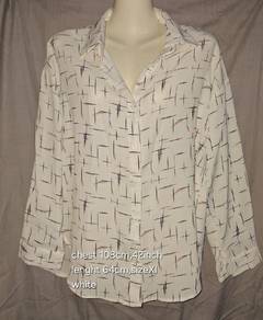 White long-sleeved shirt with abstract