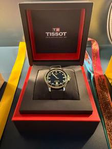 Tissot black and gold seastar 1000
