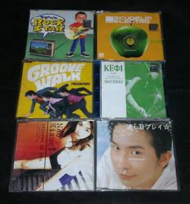 6 JAPANESE SINGLES Cds