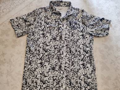 Original Puma Golf polo jersey
Size XL pit 21x28