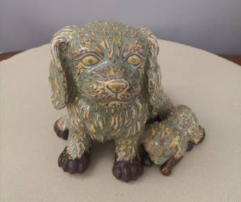 Ceramic dog with puppy figurine
