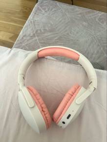 Baby pink headphones