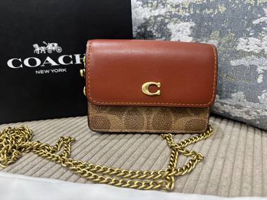 coach flap sling wallet