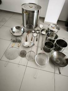 used pots, wok, bowls, cooking utensil