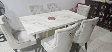 marble table with 6 seater chairs