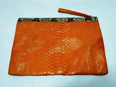 Orange snakeskin leather bag