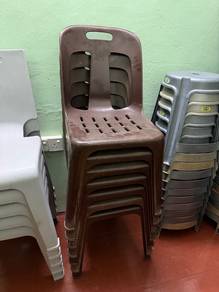 7 Brown Stackable Plastic Chairs 