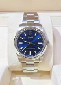 Pre-Owned Rolex 124200 OP Blue Dial 34 mm