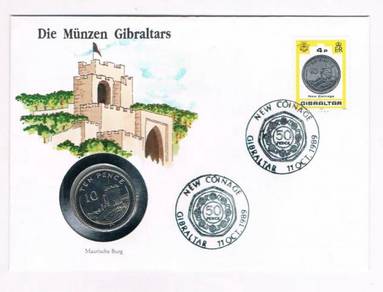 Gibraltar 10 pence coin and stamps 1990