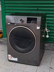 TCL 2IN1 front load hot washer with dryer 10/6k.g