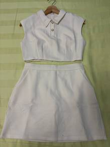 cream colour skirt and top