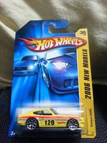Hotwheels Datsun 240Z yellow 2006 card not Tomica