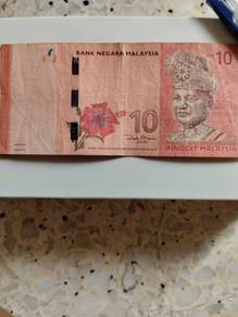 Rare replacement Rm10 note.